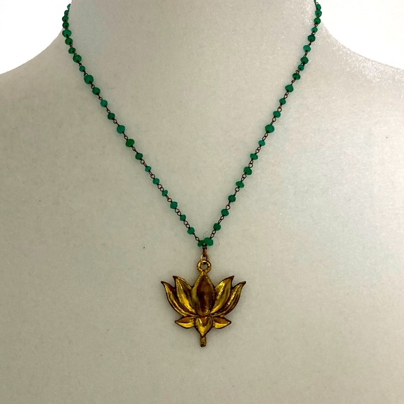 Elegant burnished Gold Lotus Pendant Necklace with green crystal stone beads. - Picture 1 of 6